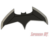 Black and gray bat-shaped throwie with angular wings and central bat logo design. - SuperheroDIY