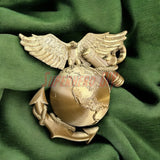 3D Marine Corps EGA insignia wall-mountable plaque on green background, featuring eagle, globe, and anchor design.