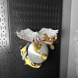 3D Marine Corps EGA insignia wall-mounted with Eagle, Globe, and Anchor design in gold and silver colors.