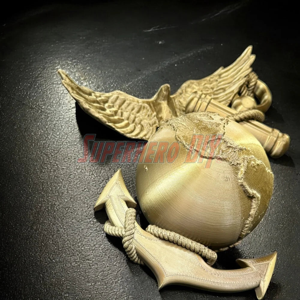 3D Marine Corps EGA insignia in gold, featuring an Eagle, Globe, and Anchor design. Wall-mountable USMC plaque for decor or celebration.