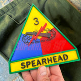 3rd Armored Division display insignia featuring Spearhead emblem in vibrant colors.