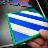 3rd Infantry Division display insignia with blue and white stripes held in hand, ready for display.