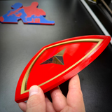 3rd Marine Division insignia with gold border held in hand, showcasing layered relief design.
