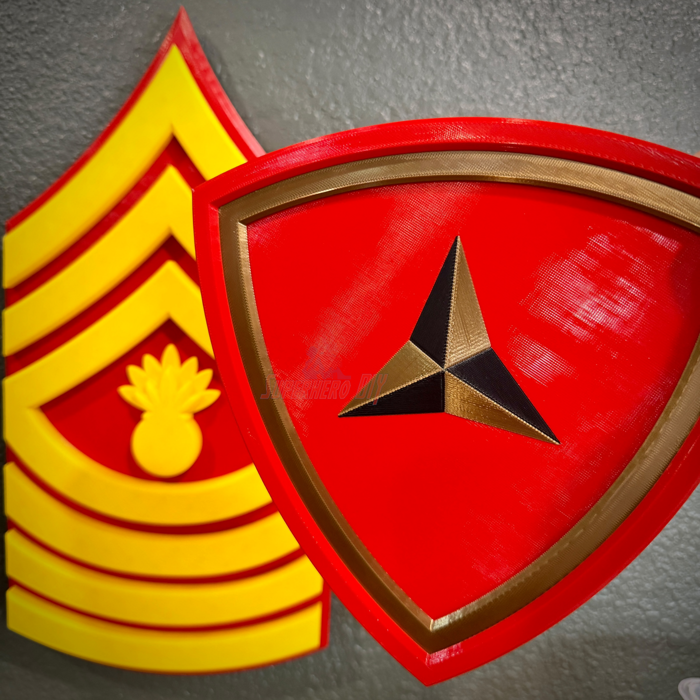 3rd Marine Division insignia in layered relief design with scarlet shield and gold accents.