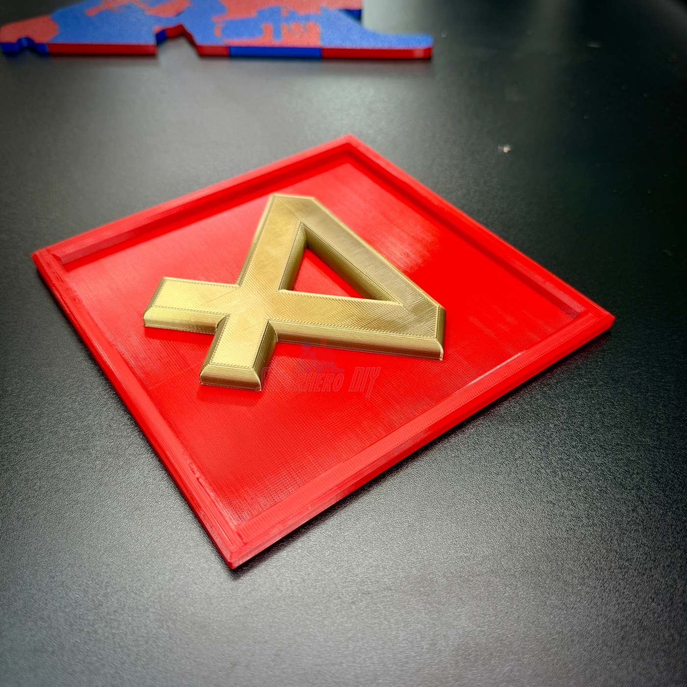 4th Marine Division display insignia with a gold numeral four on a red background, perfect for wall displays.