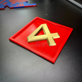 4th Marine Division insignia in layered relief with gold numeral four on red background for display.