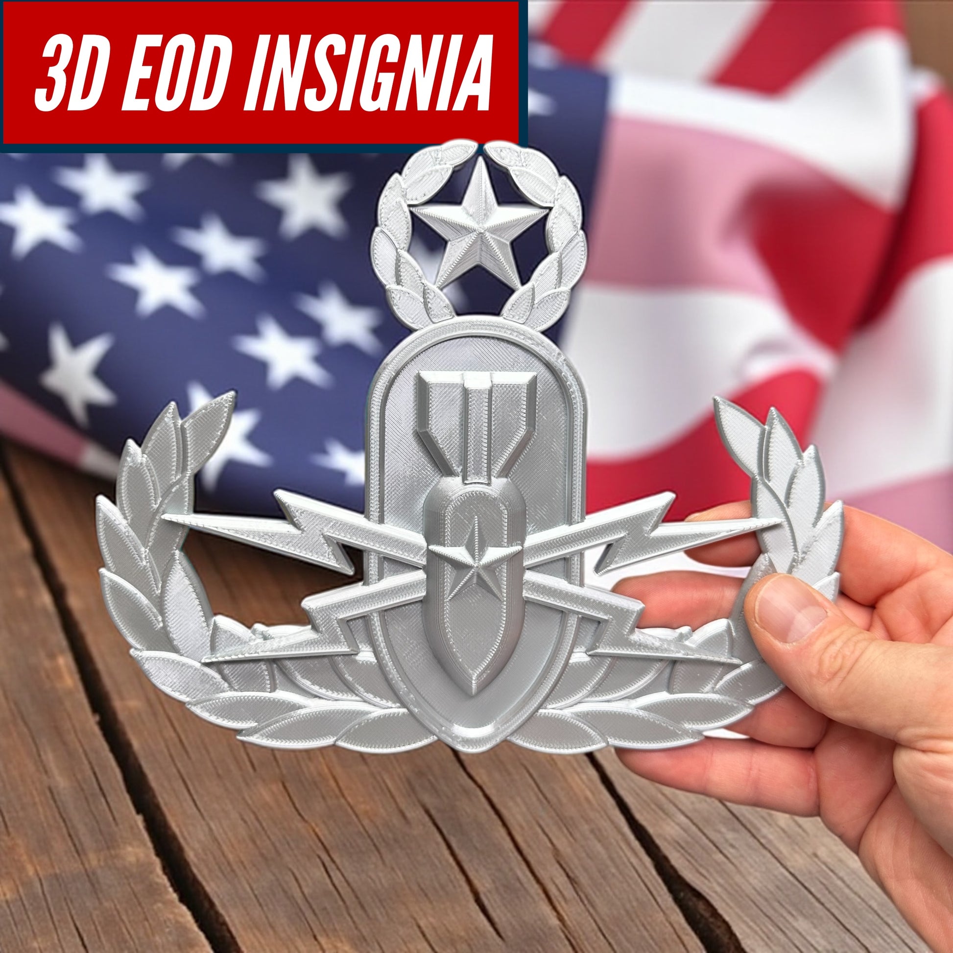 Replica EOD Badge Display held in front of an American flag