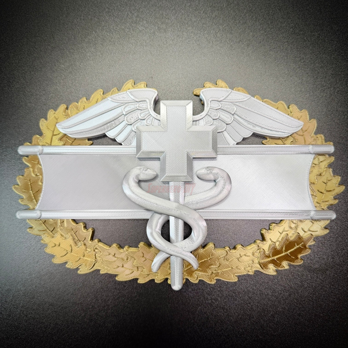 Army medical badge display insignia featuring caduceus, symbolizing EFMB, CMB, MCMB, designed for Army Medics.