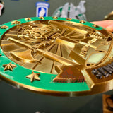 Army Instructor Badge display round medal with green border and gold emblem, showcasing intricate design details.