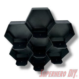 Wall-mounted honeycomb shelf for Disney Doorables, holds 7 figures with foot pegs for stable and organized display