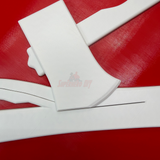 84th Training Command display insignia parts in white color arranged on a red background.