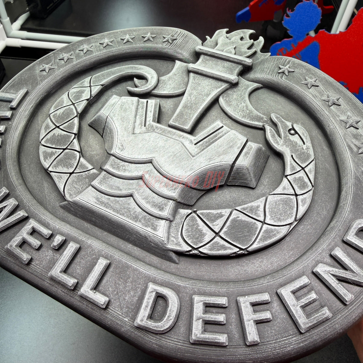 3D U.S. Army Drill Sergeant Badge insignia in multiple sizes for display, emphasizing the phrase 'WE'LL DEFEND'.