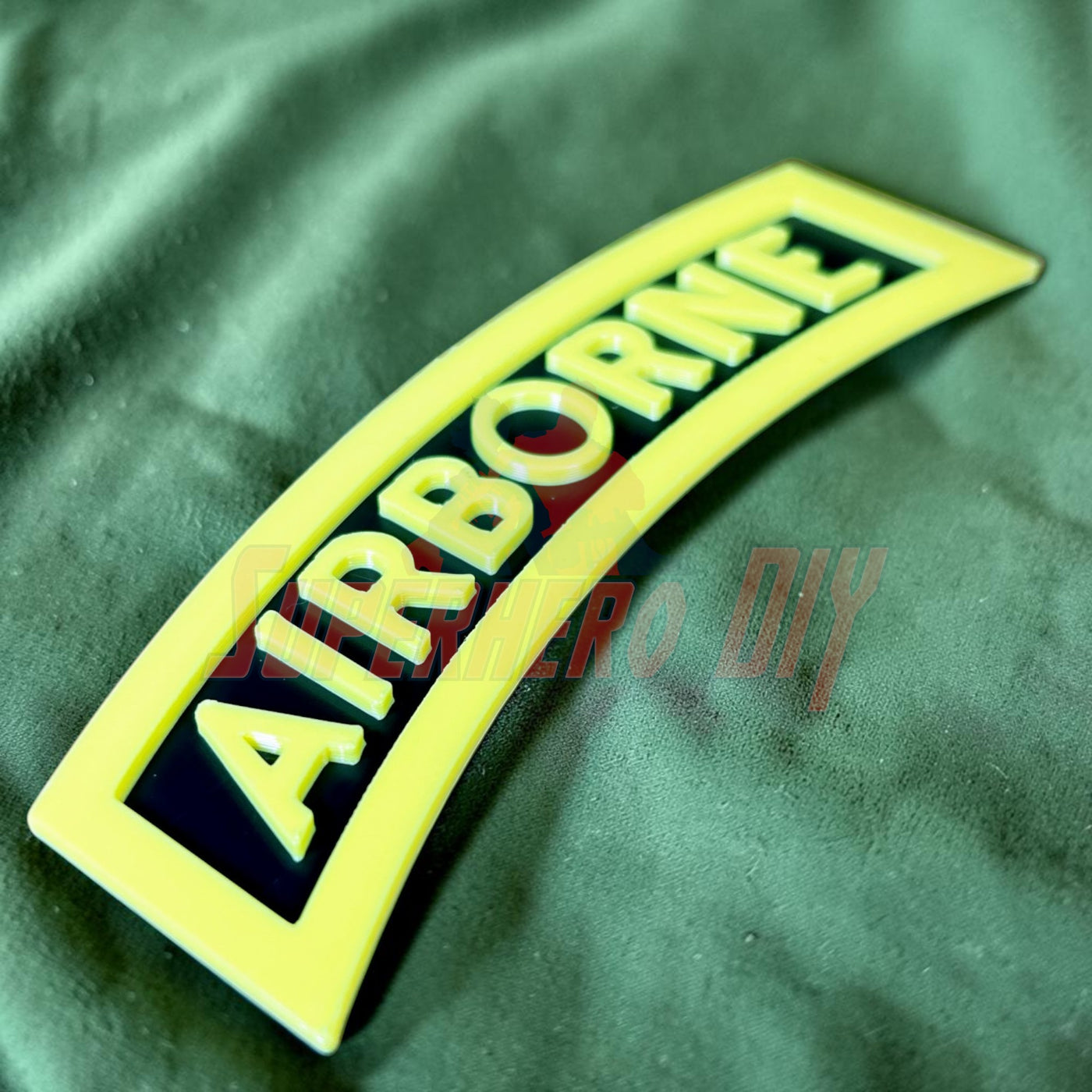 3D airborne tab displayed on a solid black background with bold yellow lettering.