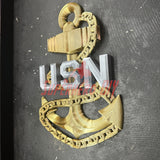Navy enlisted rate insignia with gold anchor and silver USN letters on black background. - SuperheroDIY