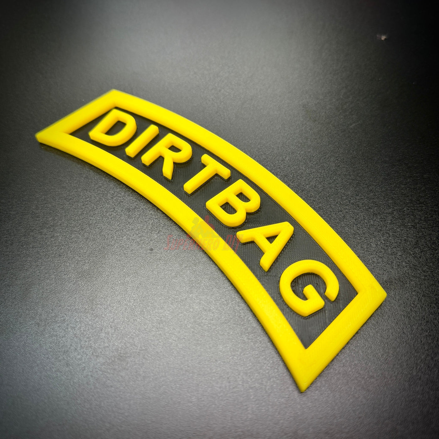 DIRTBAG tab in yellow and black, a gag gift for Army buddies and soldiers.
