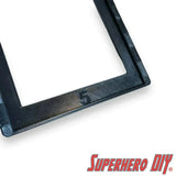Close-up of black Hot Wheels wall display sleeve for 1:64 scale vehicle display, featuring Superhero DIY logo.