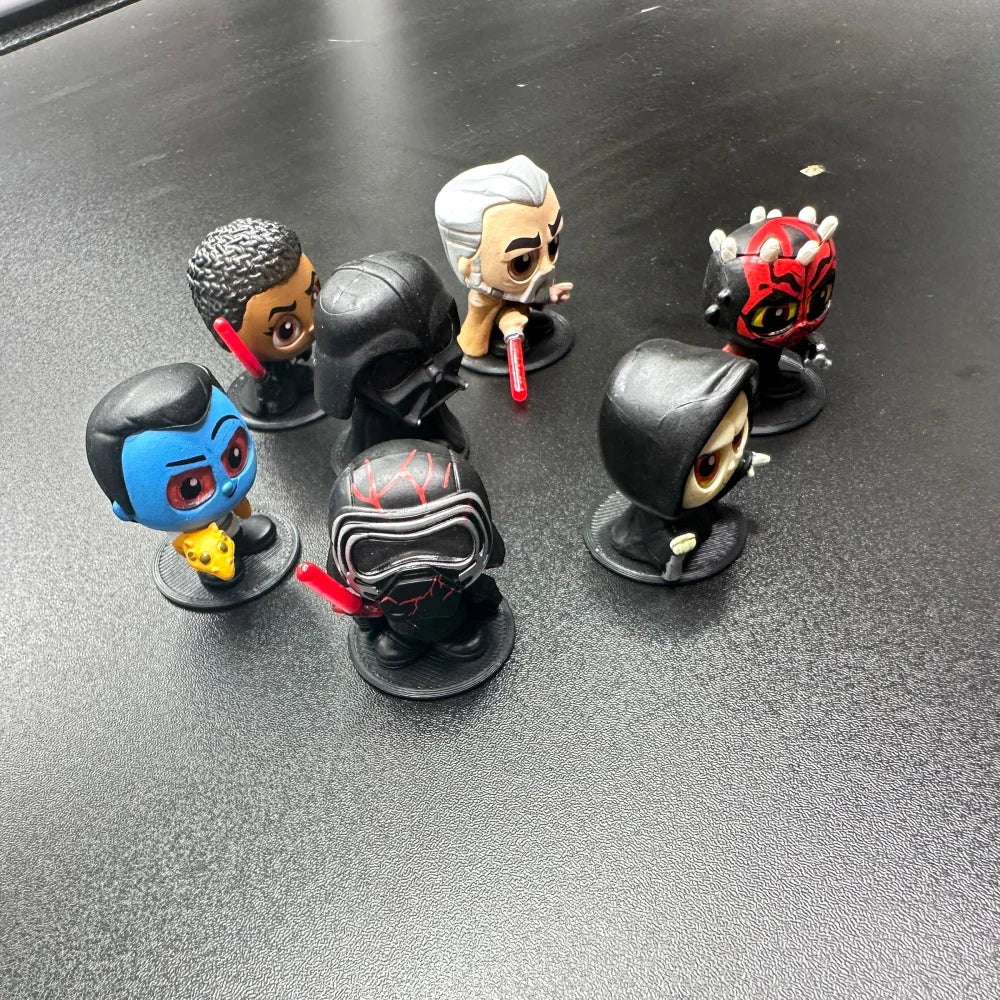 Display Stands for Disney Doorables Figures Peg Bases to Keep Standing with multiple characters arranged.