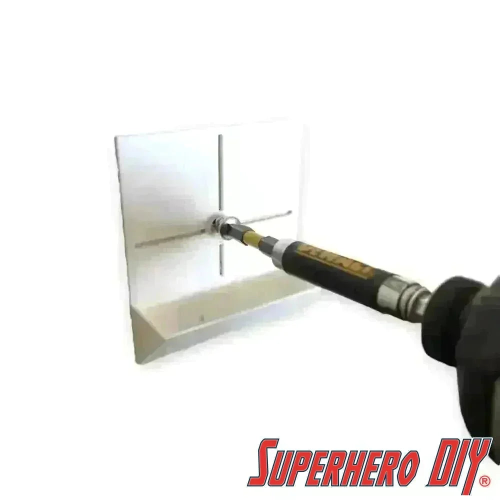 drilling dust collector catching wall debris with a drill in operation