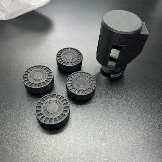 Mini Mine Canister The Batman 2022 with four mini mines and a canister on a dark background.