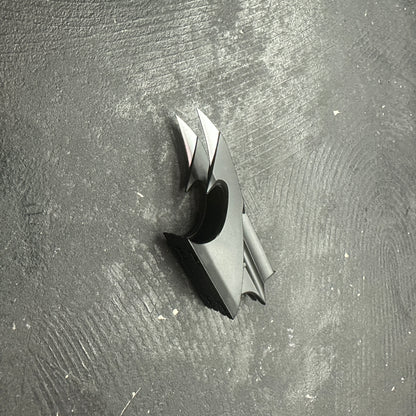 NECA BATMAN 1989 Folding Magnetic Batarang (LOOSE) displayed on a textured black surface.