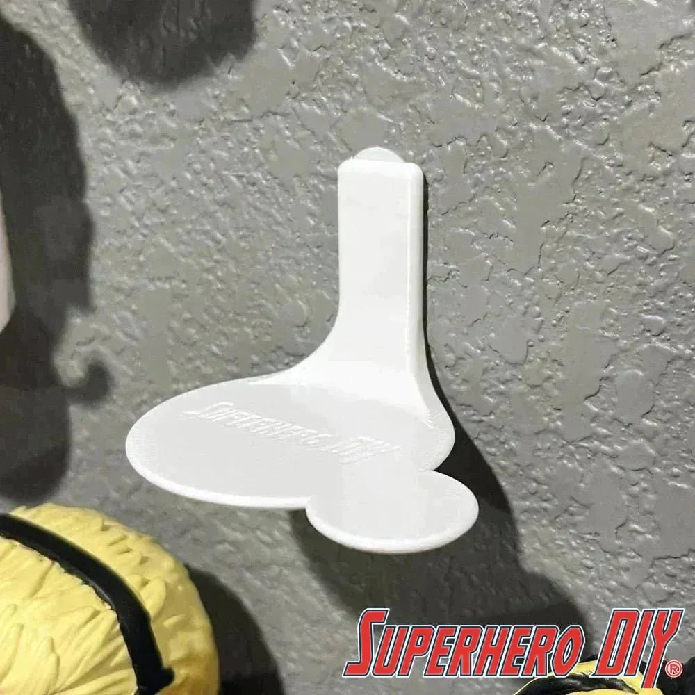White wall-mounted display shelf for Funko Pop & Buddy, designed for 4-inch Pop figures and their companions.