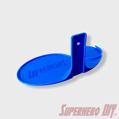 Blue floating shelf with curved front and vertical back support, sized for Funko Pop figures. - SuperheroDIY