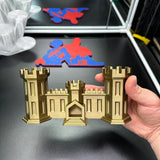 3D-printed Army Engineer Castle held in hand, representing U.S. Army Corps of Engineers, symbol of resilience and service.