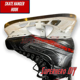 Close-up of a skate on a wall-mounted hockey gear organizer with a skate hanger hook.