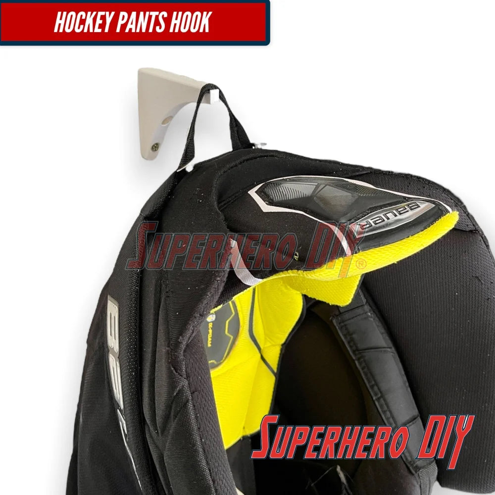 Hockey pants hook from Superhero DIY, designed for wall-mounted hockey gear organizer use.