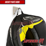 Hockey pants hook from Superhero DIY, designed for wall-mounted hockey gear organizer use.