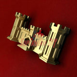 3D-printed Army Engineer Castle on a red background, symbolizing the U.S. Army Corps of Engineers, resilience, and tradition.