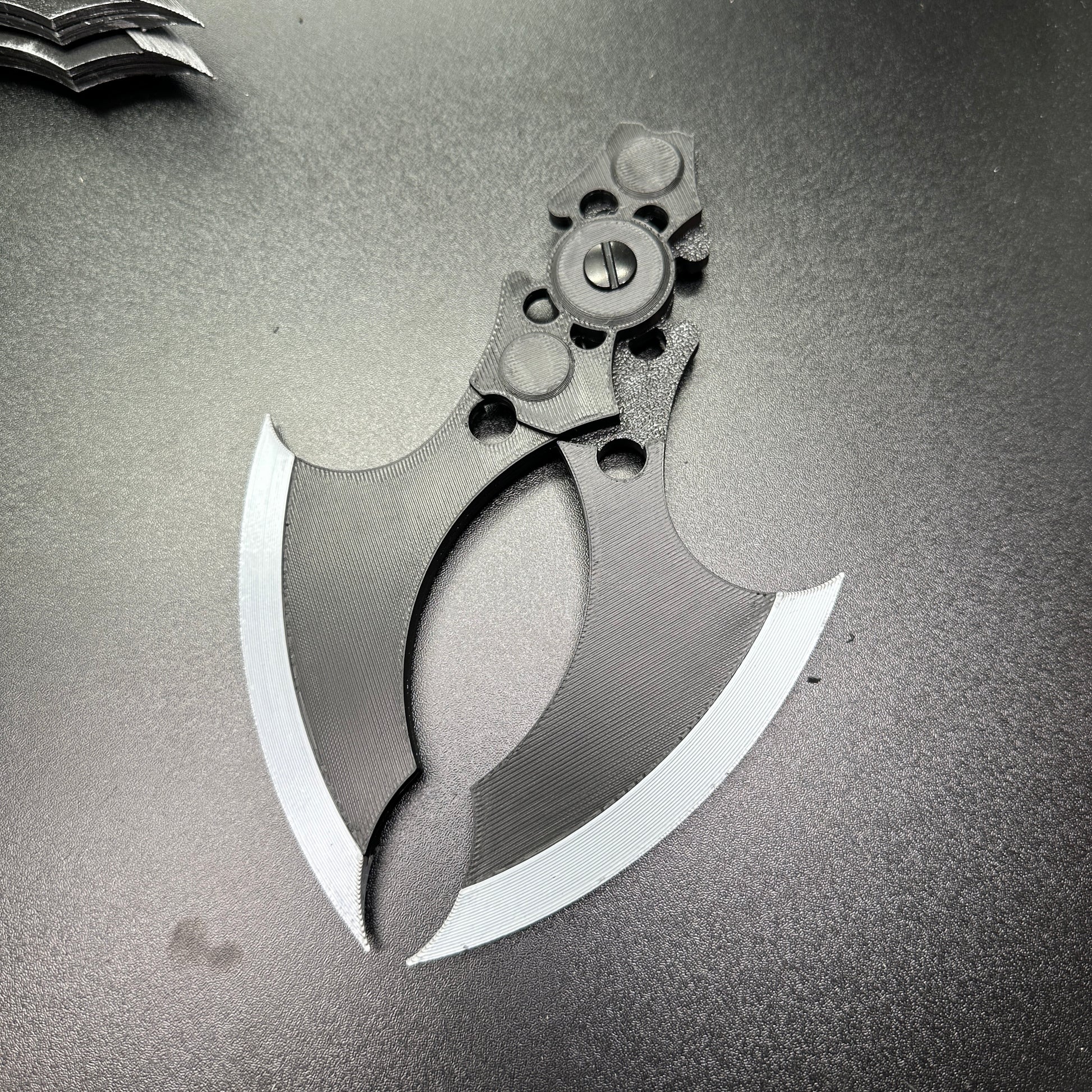 MAGNETIC Folding Arkham Batarang Cosplay Prop - 10" version on dark surface, open with silver accents and visible magnet mechanism.