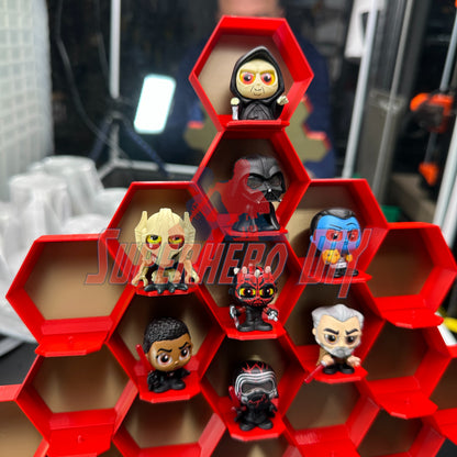 Honeycomb Display for 24 Disney Doorables showcasing figures in a red 3D-printed honeycomb structure, organized for collectors.