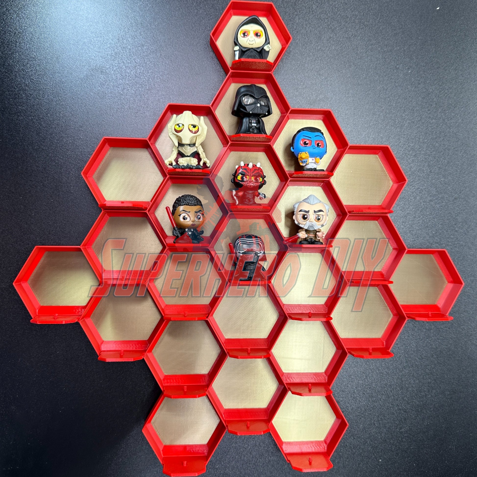 Honeycomb Display for 24 Disney Doorables showcasing collectible figures organized in a red 3D-printed honeycomb design.