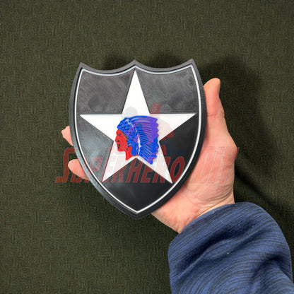 Hand holding a 2nd Infantry Division display insignia patch for military wall display