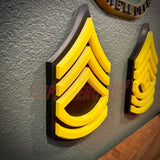 3D-printed Army enlisted rank insignia showcasing yellow and black colors, perfect for military displays.