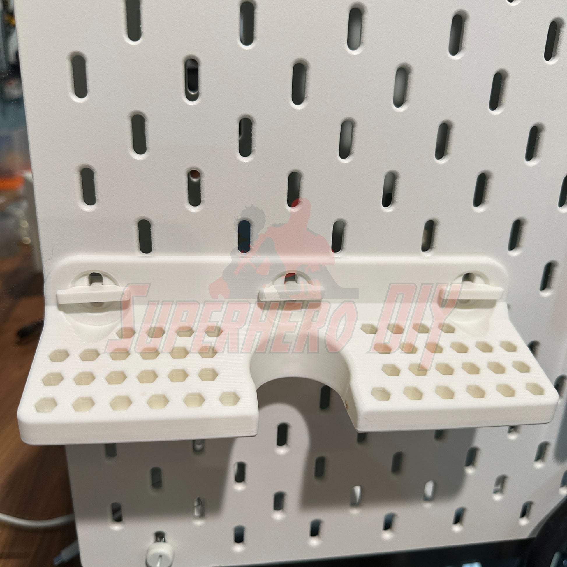 DeWalt cordless screwdriver organizer on SKADIS wall-mounted system for tool storage