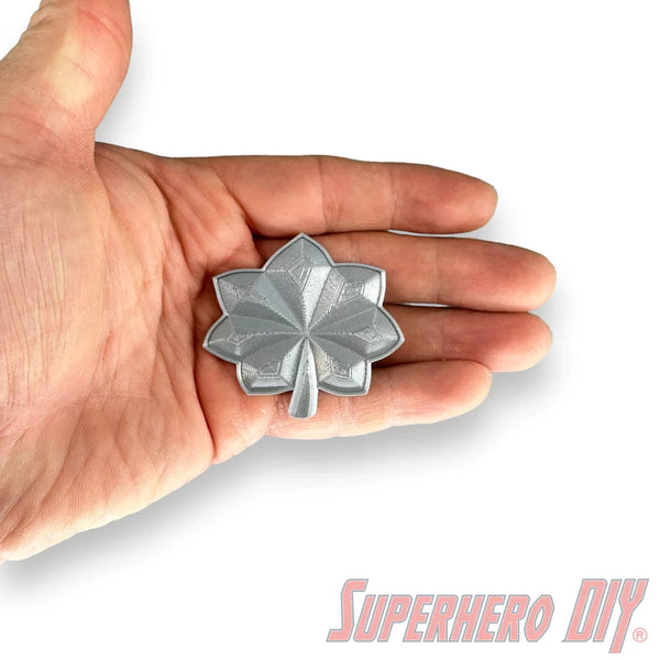 Lieutenant colonel rank insignia displayed in a hand, showcasing its shiny silk PLA finish and detailed design.