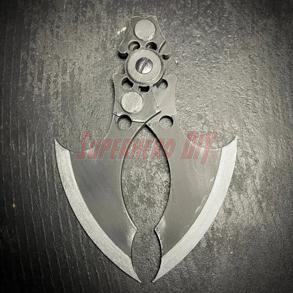 MAGNETIC Folding Arkham Batarang Cosplay Prop - 10" version with locking mechanism on black surface.