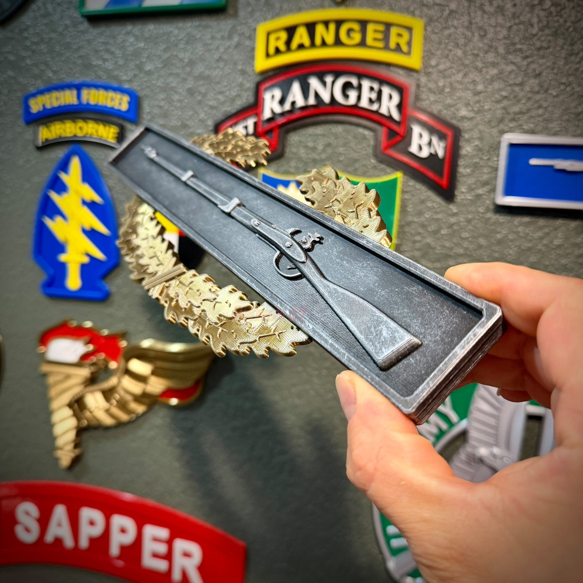 MCIB wall display with the master star set above the wreath and infantry bar