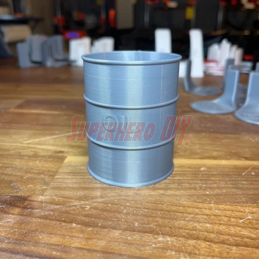 Mini oil drum desk organizer for storing candy or small items, perfect as a desk accessory or gag gift.