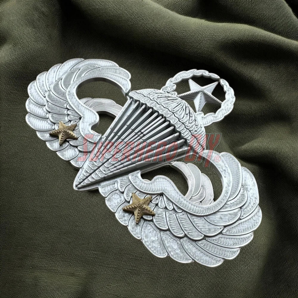 Jump Wings replica badges on fabric, displaying Army Parachutist insignia.