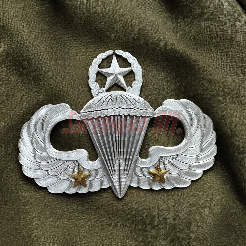 Jump Wings Parachutist Badge on military green fabric background