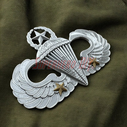 Jump Wings Basic, Senior, Master Parachutist Badge displayed on fabric