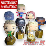 Display riser stands for Funko Pop collection showcasing various figures on pedestal risers.