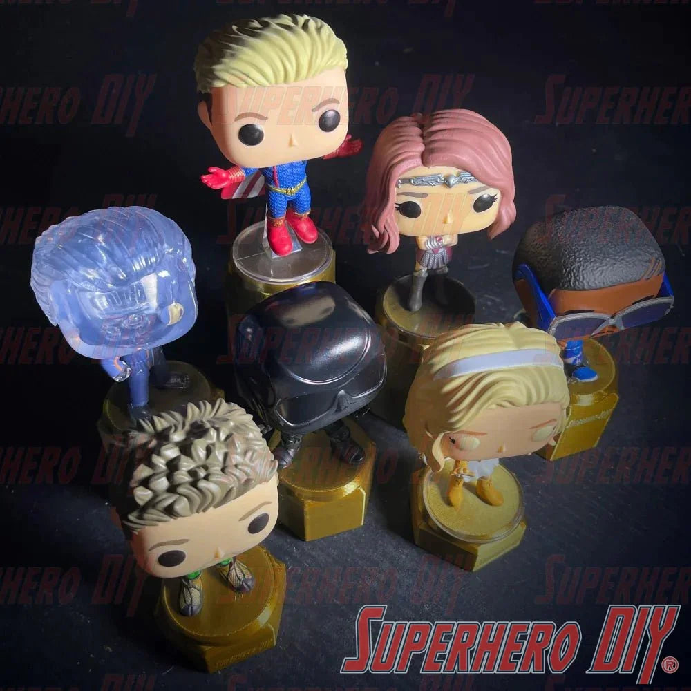 Display riser stands for Funko Pop showcasing a variety of figures on different height pedestals.
