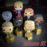 pedestal display riser stands for Funko Pop figures arranged in a staggered tiered display