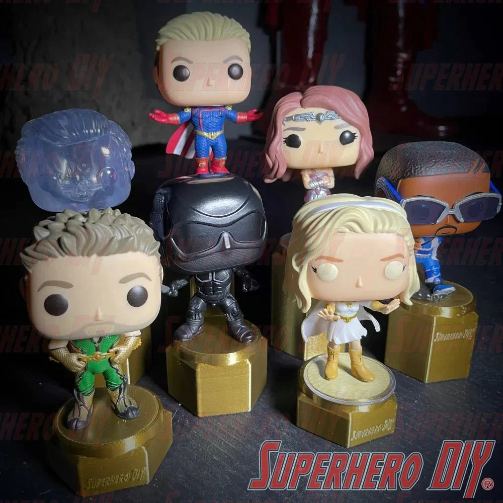 Display riser stands for Funko Pop featuring various collectible figures on gold pedestal bases.