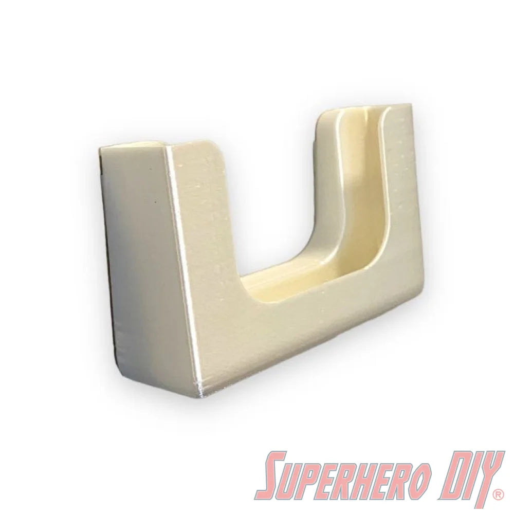 Wall-mounted phone holder "Potty Pocket" with a simple design and Command strips for bathrooms or other convenient spaces.