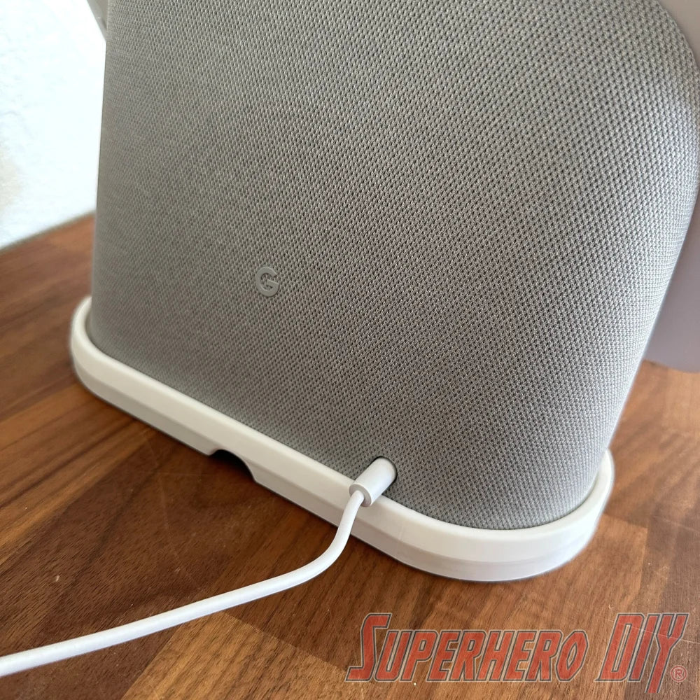 Google Nest Hub Max riser stand on wooden counter, close-up view